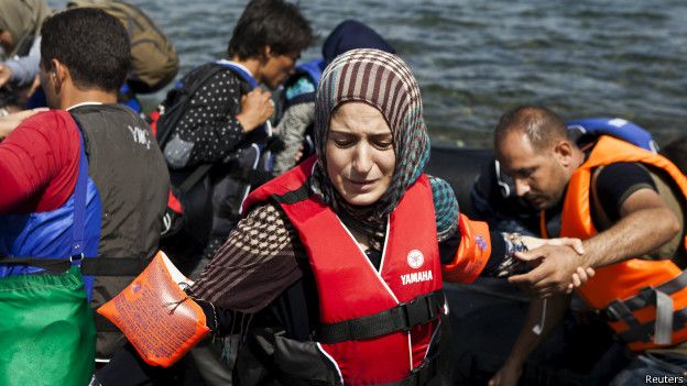 Migrante siria en un barco