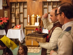 Brothers Gabriel Corzo and Plinio Savio Quarto from the Brazilian "Heralds of the Gospel" congregation conducted ceremonies in Portuguese at the Saint Augustine Roman Catholic Mass on Monday. Photo by Sam Moore